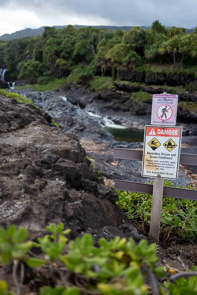 A warning sign at the Oheo Gulch pools on Maui, Hawaii.