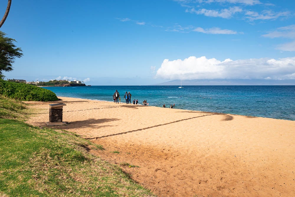 View of the sand and ocean at Airport Beach in Maui Hawaii