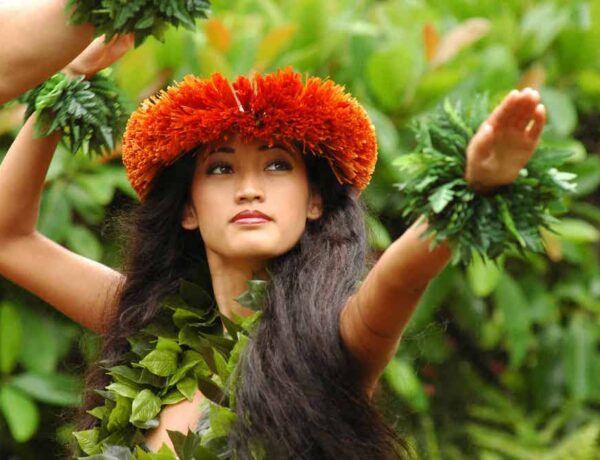 A Hawaiian dancer performing at the Andaz Maui luau in Wailea, Maui.