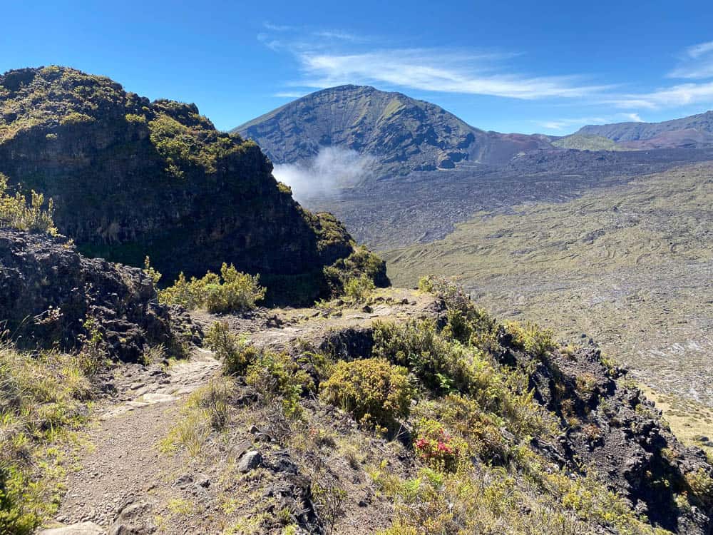 The rocky Halemauʻu trail at Haleakala National Park with a view of the valley below.