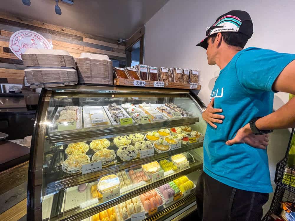 A man looks at the pastry case inside of Sugar Beach Bake Shop in Kihei Maui